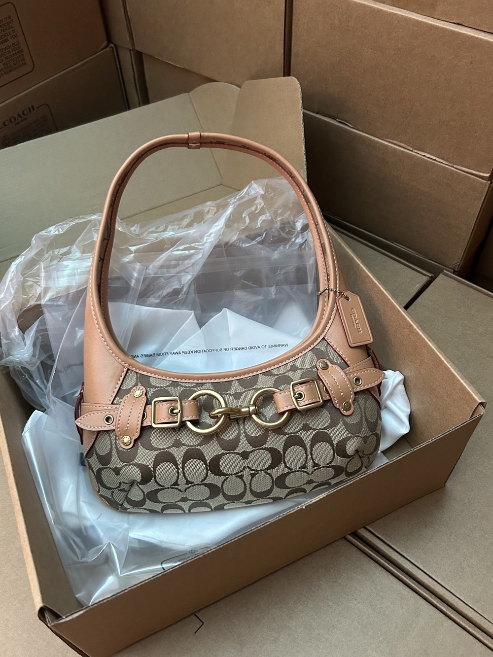 Coach crescent-shaped underarm bag
